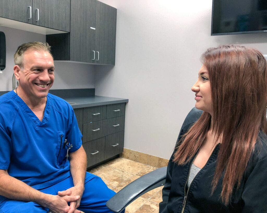 Dr. Nalbone smiling at a patient